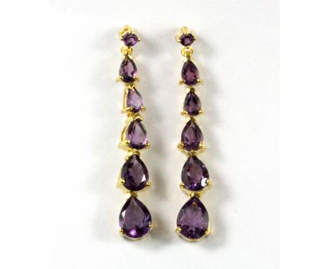 A pair of 925 silver gilt pear cut amethyst set drop earrings, L. 4.6cm.