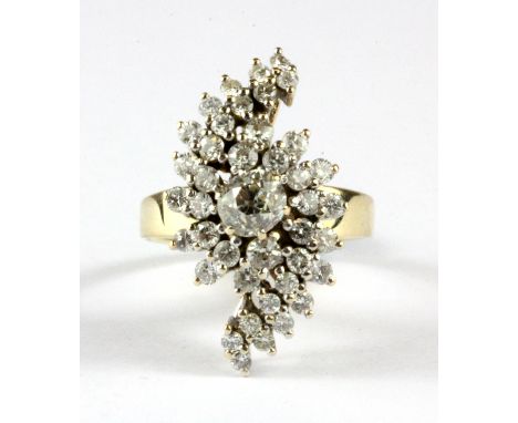 An 18ct yellow gold diamond set cocktail ring, (O.5).