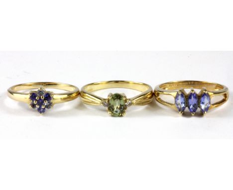 Two 9ct yellow gold tanzanite set rings and a 9ct gold stone set ring, (N.5).