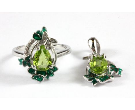 A 925 silver and enamel, pear cut peridot set ring and matching pendant and chain.