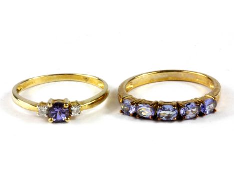 A 9ct yellow gold tanzanite and diamond set ring and a further tanzanite set ring, (N.5).