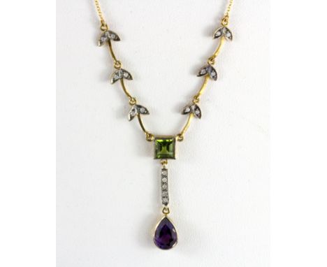 Suffragette interest. A 9ct yellow gold amethyst, peridot and diamond set necklace, L. 42cm.