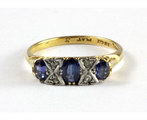 An antique 18ct yellow gold and platinum sapphire and diamond set ring, (O.5).