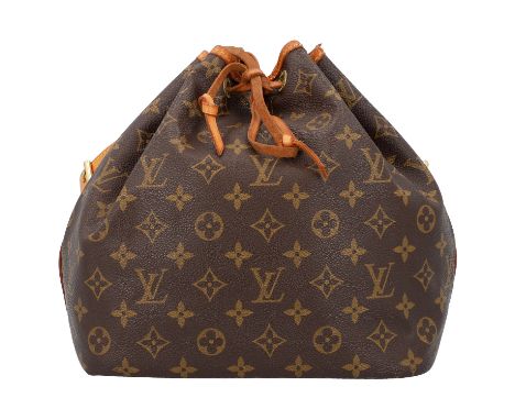 LOUIS VUITTON VINTAGE Beuteltasche "NOÉ". Monogram Canvas Serie mit naturbelassenem Leder (sehr starke Patina) und Hardware i