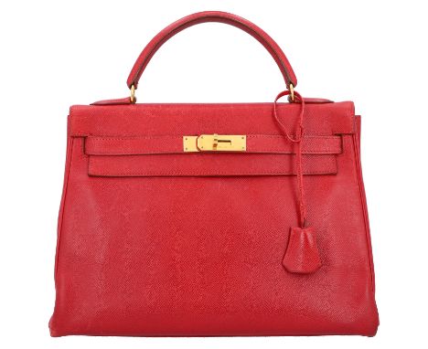 HERMÈS VINTAGE Handtasche "KELLY BAG 32". Koll. 1993. Epsom Leder in Rot mit goldfarbener Hardware. Klassisches Modell mit zw