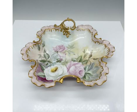 Beautiful Rosenthal porcelain bowl featuring a delicate baby pink glaze and an elegant scalloped edge design. The bowl is sig