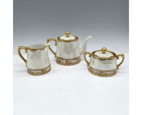 White porcelain with a smooth glazed finish. Rich gold-tone accents enhance the rims, handles, and lids, showcasing detailed 