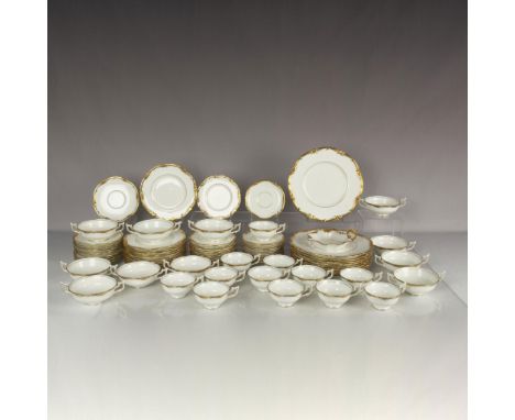 Coalport's discontinued Eden pattern can be identified by its thick gold scalloped trim on a solid white plate. This lot incl