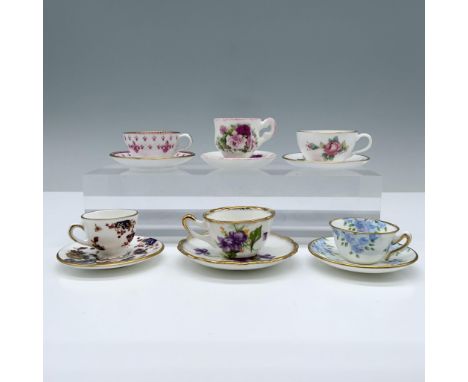 The collection of 6 miniature cups and saucers includes: 2 Spode sets, 1 in the Billingsley Rose Spray pattern and 1 with a p