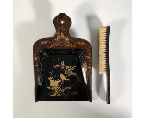 A charming cleaning set crafted from papier mache and finished with a glossy lacquer, adorned with intricate gold-colored ena