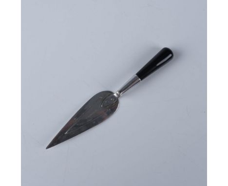 A sleek vintage paper knife featuring a sterling silver blade and an elegant black onyx handle. The blade is hallmarked Sheff