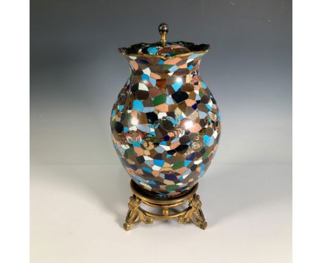 An exquisitely enameled bronze vase featuring a mosaic-like colorful pattern, decorated with intricate crab designs, and topp