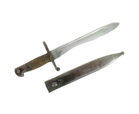 A WWII Second World War Spanish M1941 Bolo rifle bayonet having a black chequered grip, hooked pommel with press stud, cross 