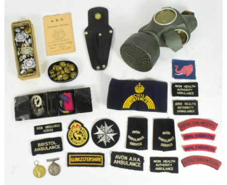 A collection of assorted First and Second World War militara to include; WWI medal pair awarded to one 28148 Pte A J Herbert 