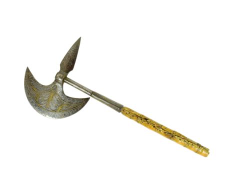 An early 20th Century Sudanese Mahdist ceremonial war axe. Crescent shaped axe head inlaid with gilt metal scrollwork and thu