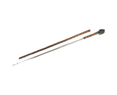 A 19th Century sword stick with concealed blade. Bronze pommel in the form of a Native American Indian, silver band and a Tol