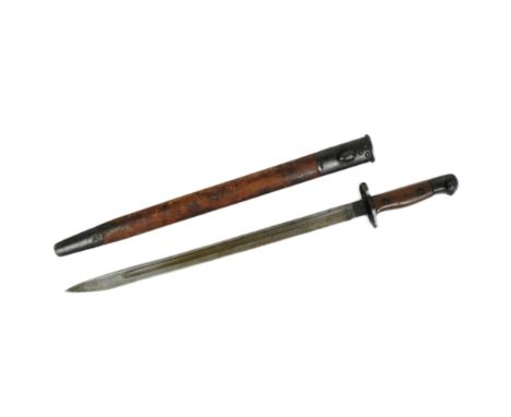 A WWI First World War British 1907 pattern Enfield rifle bayonet. Hooked pommel with working press stud, wooden grip and cros