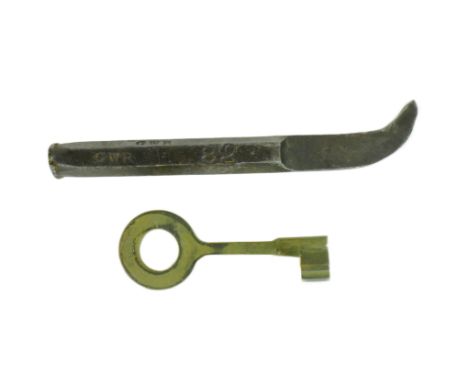 Railwayana - a brass single line railway token key stamped ' N. RLY ' on the ring together with a spanner / wrench with an oc