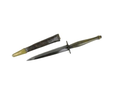 A WWII Second World War British FS Fairbairn Sykes 2nd Pattern Commando knife dagger. Round pommel with a chequered grip and 