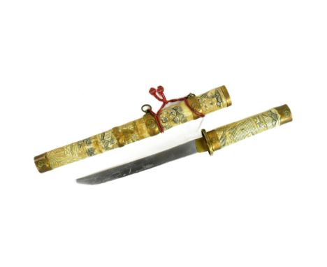 An early 20th Century Japanese Tanto knife / dagger with bone scrimshaw handle and scabbard. Extensively carved to depict Jap