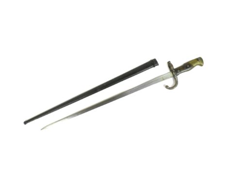 An original 19th Century French 1874 pattern Gras rifle bayonet. The hilt with brass pommel and wooden grips encasing the tan