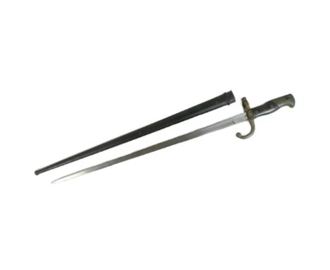An original 19th Century French 1874 pattern Gras rifle bayonet. The hilt with brass pommel and wooden grips encasing the tan