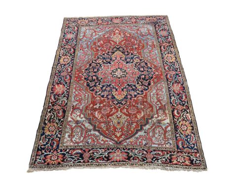 A SERAPI CARPET CIRCA 1890 approximately 377 x 257cm  Condition Report:  Wear to carpet overall. Patches of additional wear r