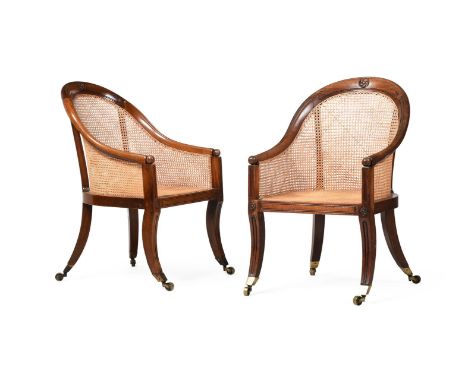A PAIR OF REGENCY MAHOGANY LIBRARY BERGERE 'CURRICLE' ARMCHAIRS ATTRIBUTED TO GILLOWS, CIRCA 1815 each 90cm high, 54cm wide, 