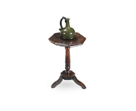 A WILLIAM & MARY OAK CANDLESTAND CIRCA 1690 51cm high, the octagonal top 34cm wide, 34cm deep  Provenance: Property from the 