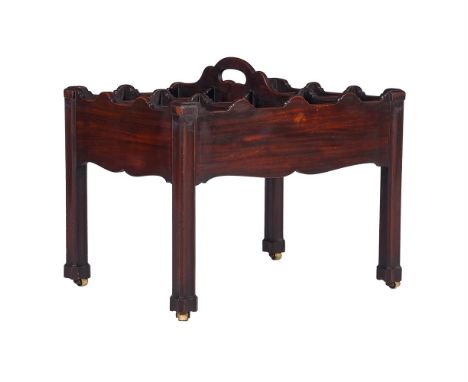A GEORGE III MAHOGANY BOTTLE CARRIER OR DECANTER STAND CIRCA 1780 The top divided with twelve sections 52cm high, 62cm wide, 