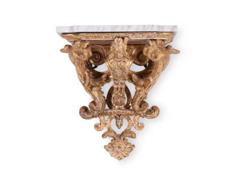 A PAIR OF CARVED GILTWOOD AND GESSO WALL BRACKETS  IN RÉGENCE STYLE, 19TH OR 20TH CENTURY Each with separate variegated grey/
