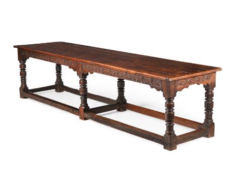 A LARGE CHARLES II OAK REFECTORY TABLE 17TH CENTURY AND LATER 81cm high, 334cm long, 84cm deep  Please note, the dating for t