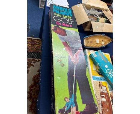 Arnold Palmers pro shot golf game by Marx, Scalextric set, various toys and games including Waddington's air charters, model 