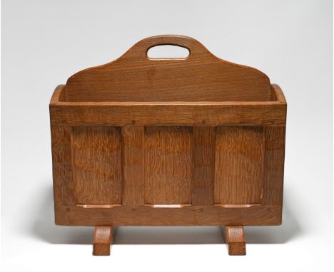 Sid Pollard of Thirsk (1914-1994) Ex Mouseman - an oak magazine, height 44cm.
