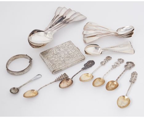 A mixed lot of silver to include a quantity of different spoons, a Continental silver ornately engraved cigarette case and an
