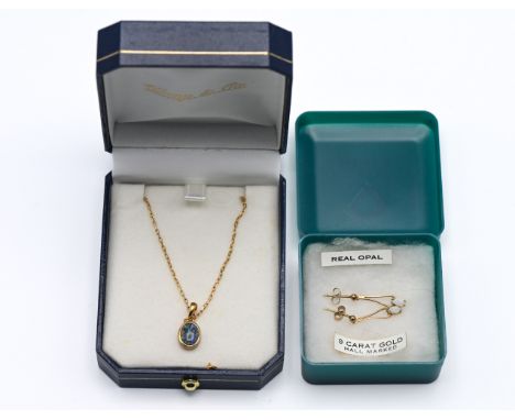 A 9ct pendant and chain set with opal together with a pair of 9ct opal earrings.