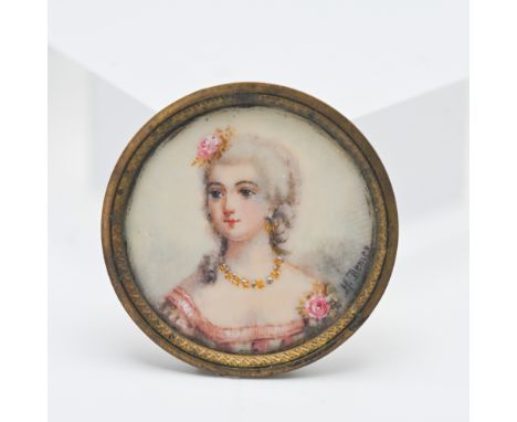 A 19th century portrait circular miniature of a Lady with necklace signed H Deniey?, 35mm.
