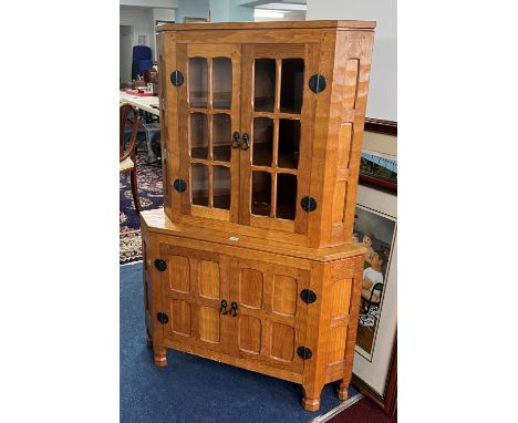 Sid Pollard of Thirsk (1914-1994) Ex Mouseman - corner cabinet fitted with two cupboards below, (two sections) height 140cm.