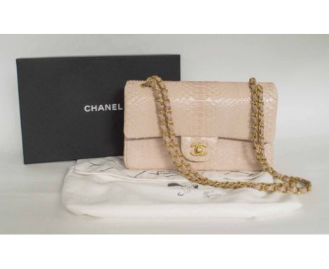 CHANEL CLASSIC FLAP BAG LIGHT PINK PYTHON, with interwoven brass and leather chain, matching leather interior, flap top with 