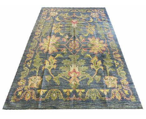 FINE BOULO OUSHAK CARPET, 294cm x 189cm, palmette design on a duck egg blue field.