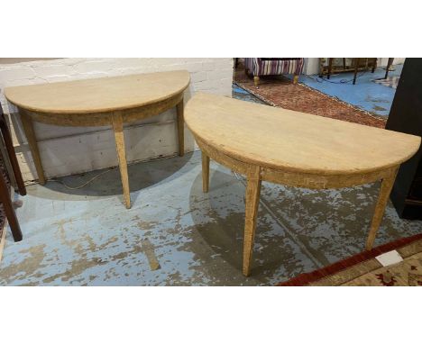 DEMI LUNE CONSOLE TABLES, a pair, 19th century Swedish pine dry scraped to original yellow ocre painted finish on square tape