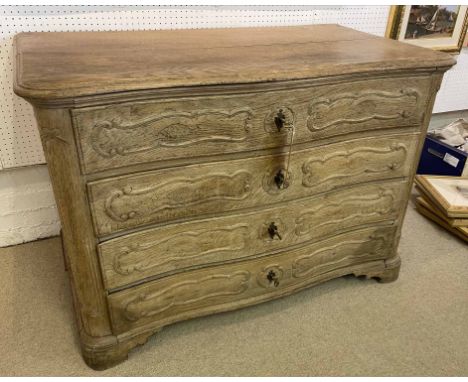 COMMODE, 19th century French oak serpentine fronted with four long drawers raised on bracket supports, 82cm H x 119cm W x 58c