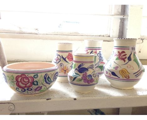 Five various Poole Pottery items.