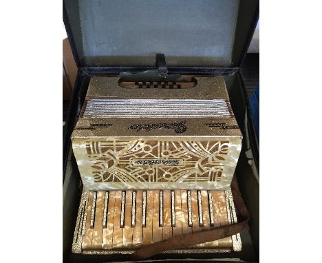 An Art Deco piano accordion.