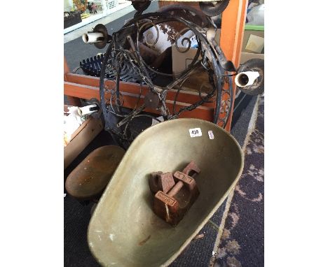 A six branch wrought iron chandelier together with a pair of heavy cast iron scales and weights.