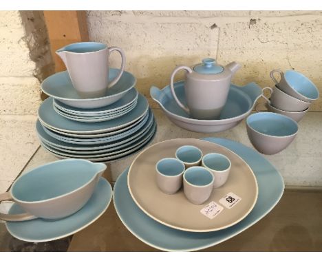 The residue of a Poole Pottery Twin Tone tea and dinner service decorated in pale blue and seagull glaze, C104.