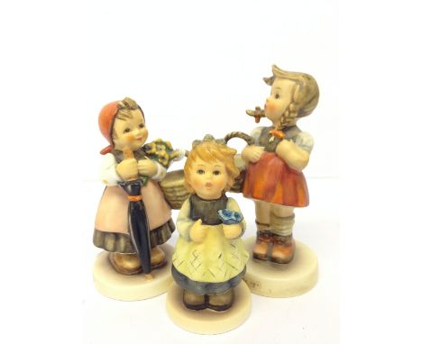Three various Goebel china Hummel figures (761, 96, 350).