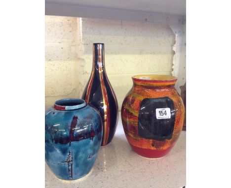 Three various modern Poole Pottery vases.