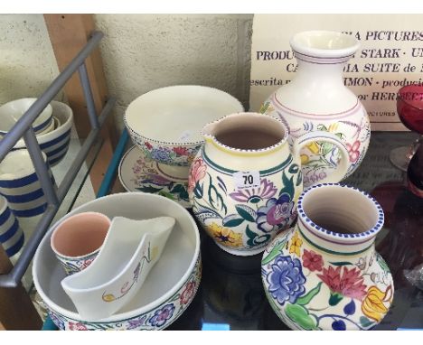 Seven various white bodied Poole Pottery items together with a Richmond Ceramics Poole style vase.