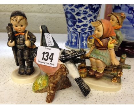 Three small Goebel Hummel figurines (two af) together with two Beswick Bird ornaments.